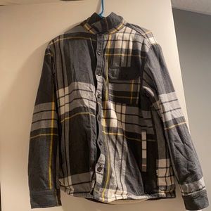This is a medium Sherpa lined North Face flannel